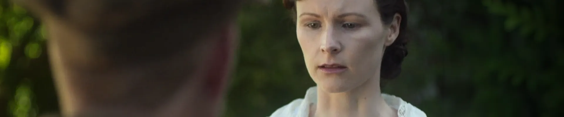 Forbidden Ground (2013) — production still, intimate two-shot, garden exterior